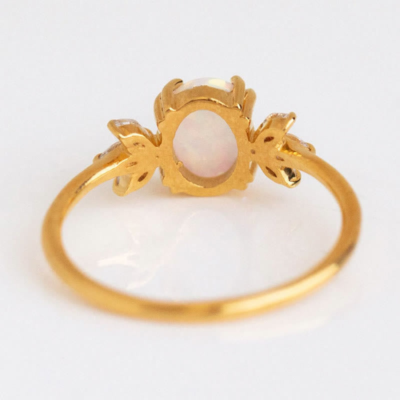 FREE Today: Oval Cut Blue Sandstone & Opal Zircon Leaf Ring