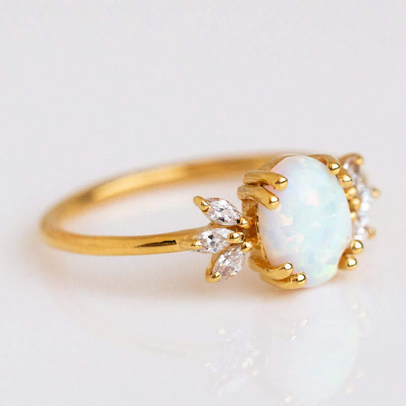 FREE Today: Oval Cut Blue Sandstone & Opal Zircon Leaf Ring