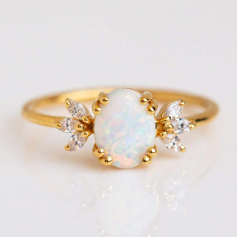 FREE Today: Oval Cut Blue Sandstone & Opal Zircon Leaf Ring