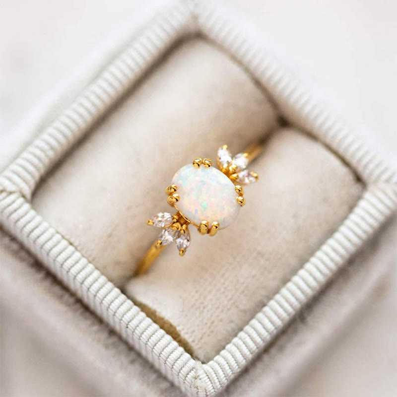 FREE Today: Oval Cut Blue Sandstone & Opal Zircon Leaf Ring