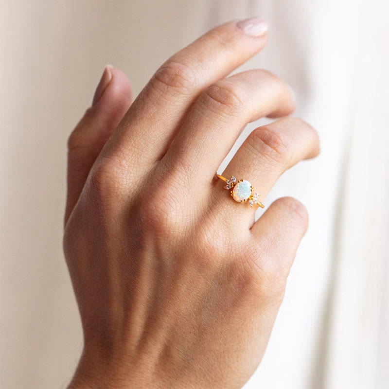 FREE Today: Oval Cut Blue Sandstone & Opal Zircon Leaf Ring