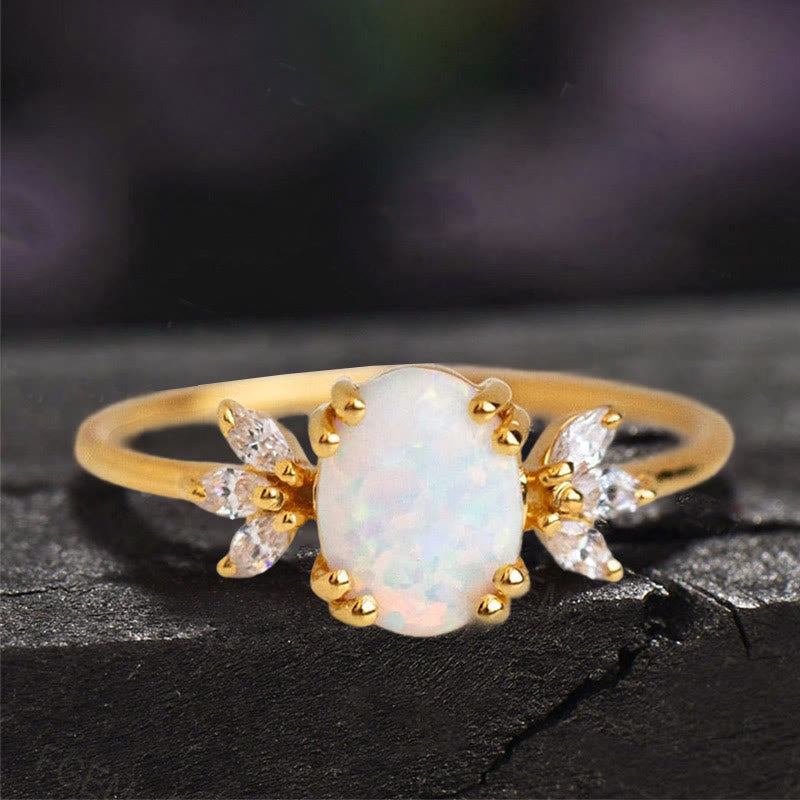 FREE Today: Oval Cut Blue Sandstone & Opal Zircon Leaf Ring