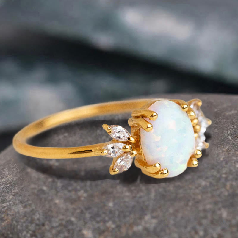 FREE Today: Oval Cut Blue Sandstone & Opal Zircon Leaf Ring